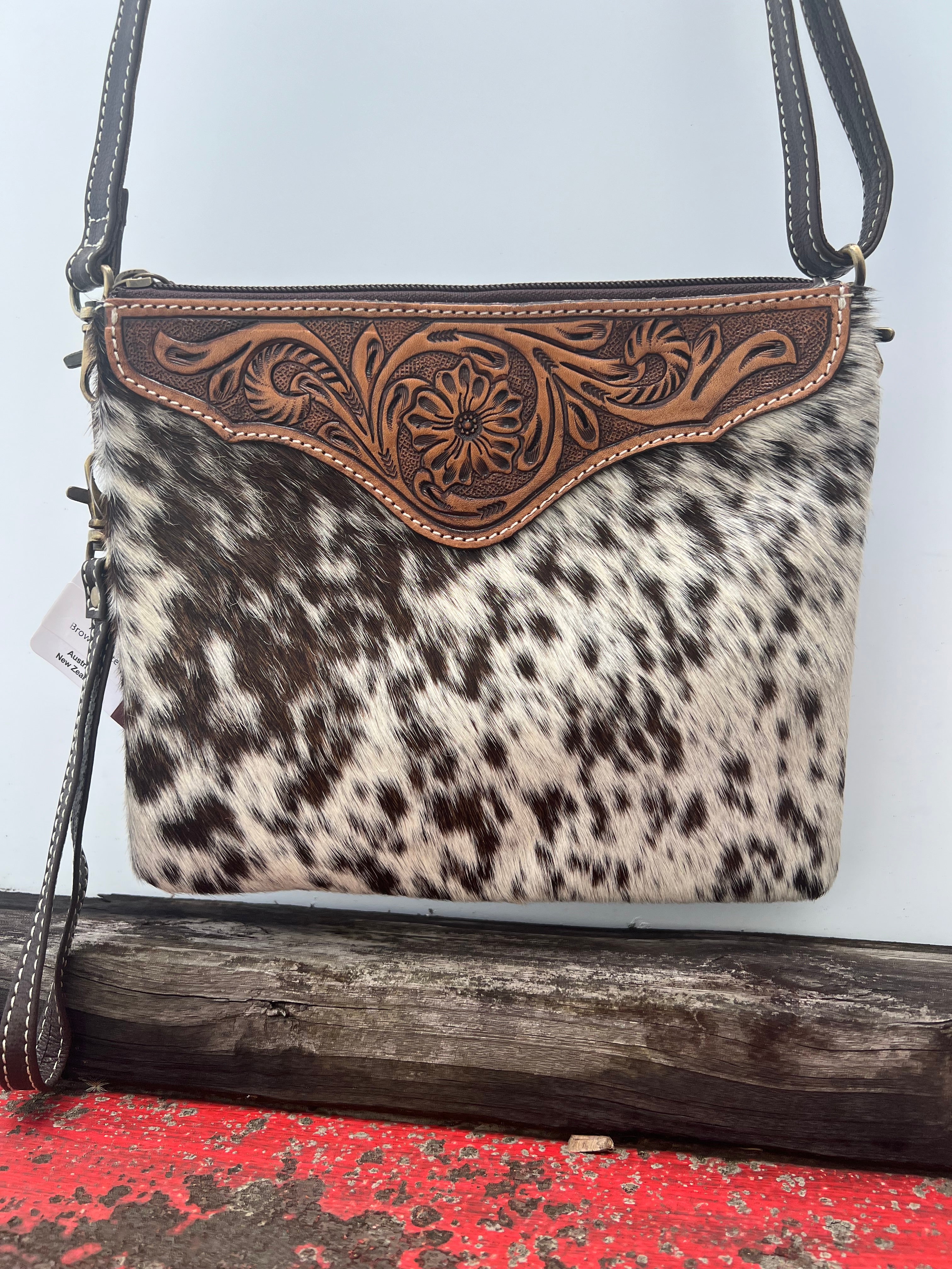 Cowhide clutch australia deals