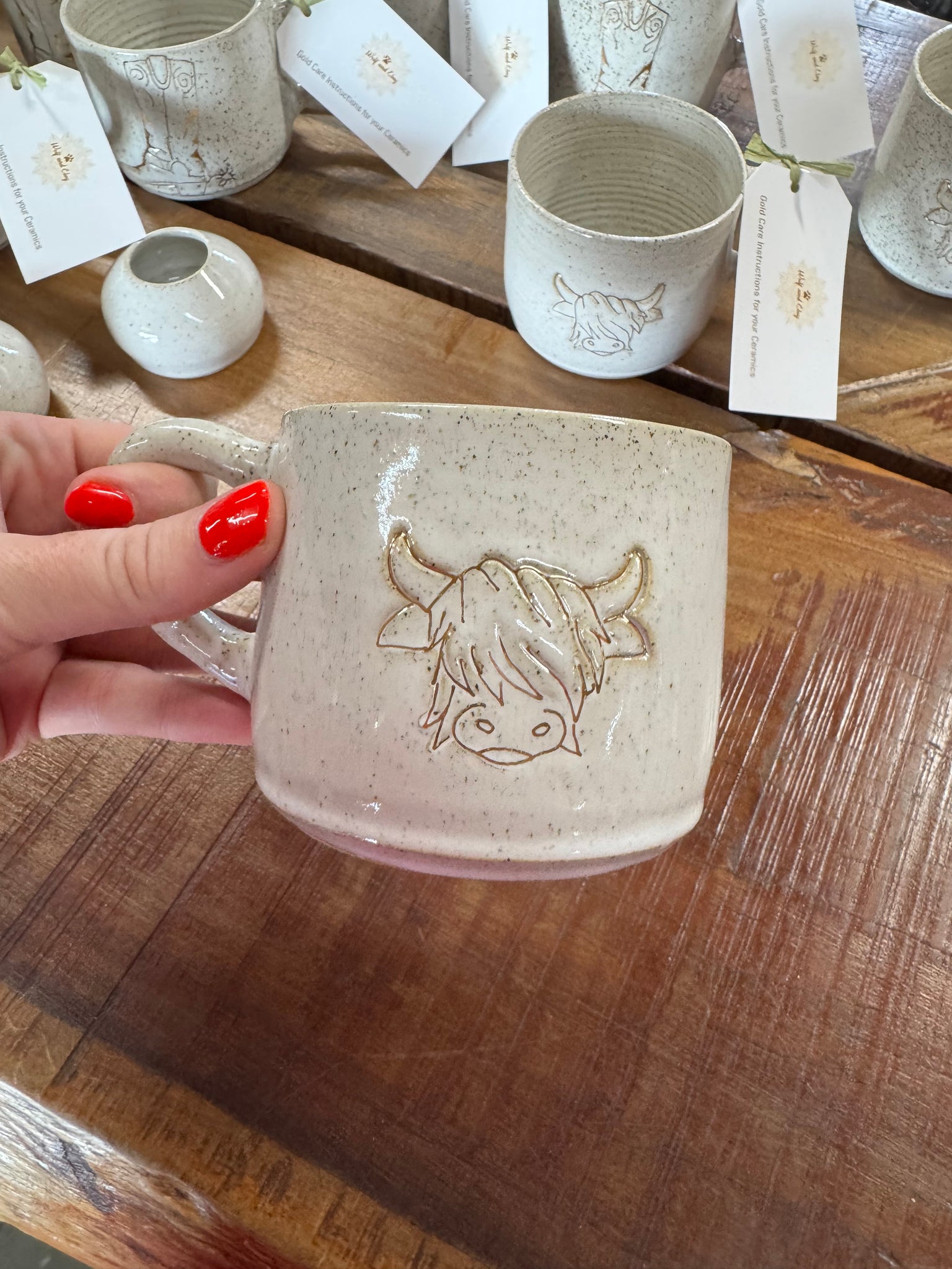Cowgirl’s Gold – Handmade Ceramic Mug with a Touch of Shine - Highland Cow